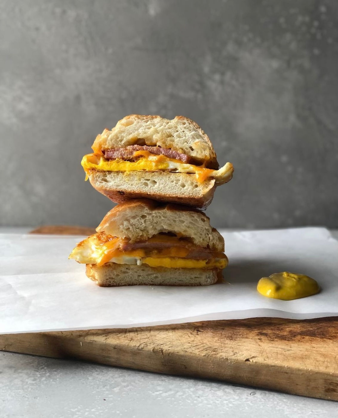 Breakfast sandwich with egg, cheese and ham